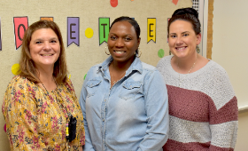 ChriShyra Blackson, center, an instructional assistant at Galena Elementary School, was the recipient of Kent County Public Schools' Golden Anchor Award last month. She is seen here with Galena Elementary School Principal Becky Yoder, left, and language s