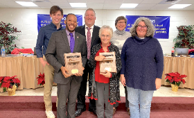 The Kent County Board of Education honored departing members Vice President Nivek Johnson and Dr. Wendy Costa at their final meeting Monday, Dec. 12. From left are student member Brayden Wallace, Johnson, President Joe Goetz, Dr. Costa and members Trish M