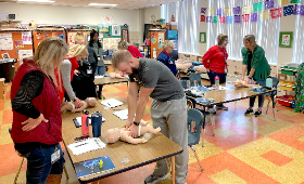 Teachers and staff at H.H. Garnet Elementary School participate in CPR training during a professional development day this fall. The Kent County Health Department has been providing CPR and Stop the Bleed training in schools.