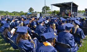 Kent County High School students sitting at graduation