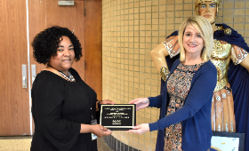 r. Renee Neely of the Maryland State Department of Education, left, presents Kent County High School Principal Kris Hemstetter with ACT American College Application Campaign School of Excellence award Tuesday, April 18.