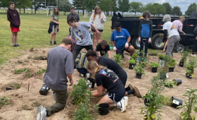 Kent County High School students help plant a pollinator garden for monarch butterflies and other species at Worton Park. The environmental action project was led by teachers Joe Evans and Jennifer Kuhl-Depp.