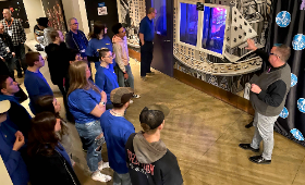 Producer and host Robert Drake leads Kent County High School students on a tour of Philadelphia radio station WXPN's studios during a field trip Friday, March 31.
